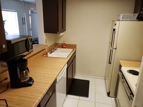 8911 Blind Pass Rd, Unit Furnished in St Pete Beach, FL - Building Photo - Building Photo