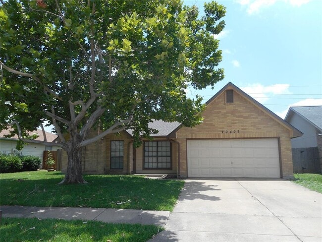 property at 20407 Blue Juniper Dr