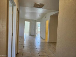 1122 Harry Ave S in Lehigh Acres, FL - Building Photo - Building Photo
