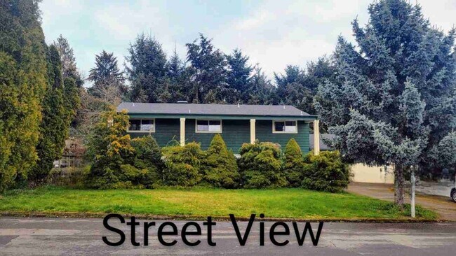 property at 6205 NE 11th Ave