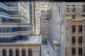 67 Wall St, Unit FL13-ID13 in New York, NY - Foto de edificio - Building Photo