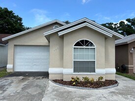 4401 Longshore Dr in Land O Lakes, FL - Building Photo