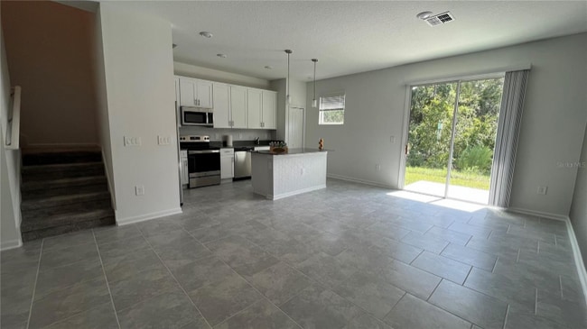 7465 Stone Crk Trl in Kissimmee, FL - Building Photo - Building Photo