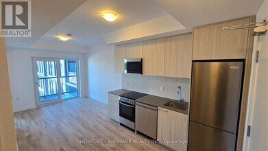 7439 Kingston Rd in Toronto, ON - Building Photo - Building Photo