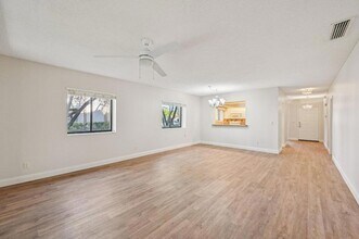 1103 Duncan Cir, Unit 104 in Palm Beach Gardens, FL - Foto de edificio - Building Photo