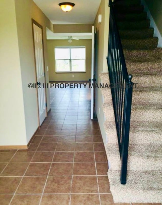 409 S Darrowby Dr in Raymore, MO - Building Photo - Building Photo