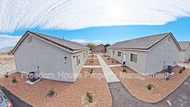 1111 Sixshooter Ave in Pahrump, NV - Building Photo - Building Photo