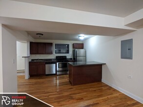 1129 W Oakdale Ave, Unit gdnn in Chicago, IL - Building Photo - Building Photo