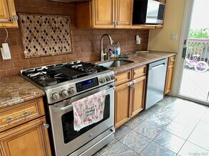 1316 Mcclure Ave in Elmont, NY - Building Photo - Building Photo