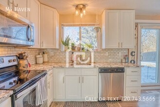 15169 E Columbia Dr in Aurora, CO - Building Photo - Building Photo