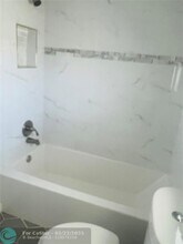 8220 Sunrise Lakes Blvd in Sunrise, FL - Building Photo - Building Photo