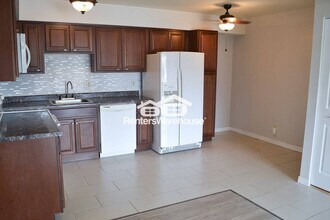 5995 W Hampden Ave in Denver, CO - Building Photo - Building Photo