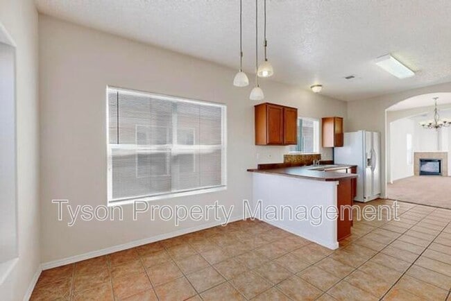 6816 Paese Pl NW in Albuquerque, NM - Foto de edificio - Building Photo