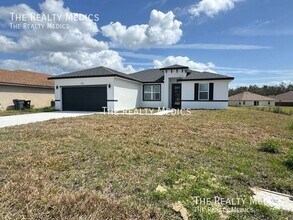 310 Dogfish Way in Poinciana, FL - Building Photo - Building Photo