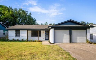 Sleekly updated Richardson home with shady backyard & patio in Richardson, TX - Building Photo