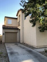6005 Secret Island Dr in Las Vegas, NV - Building Photo - Building Photo