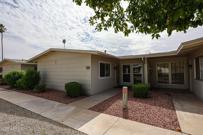 property at 10827 W Santa Fe Dr
