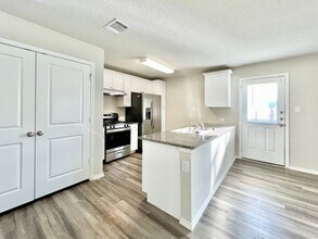 8818 Lamus Wheel in San Antonio, TX - Building Photo - Building Photo