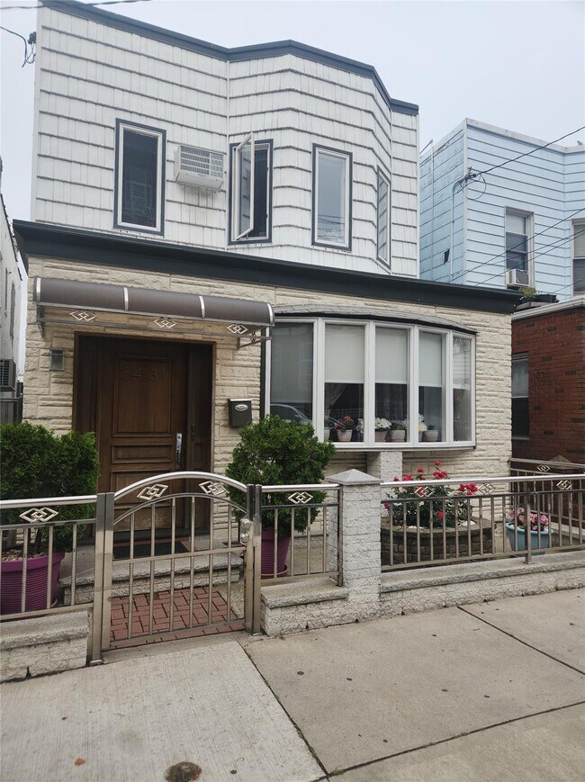 property at 54-31-54-71 71st St