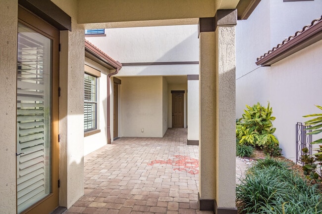 7055 Primavera Ln in Melbourne, FL - Foto de edificio - Building Photo