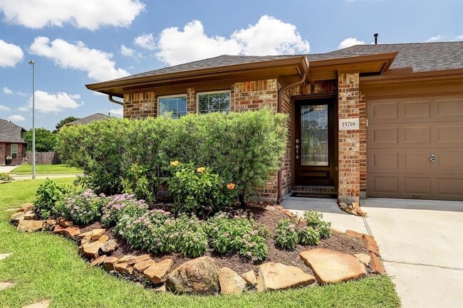 property at 15718 Whispering Green Dr