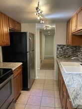 9867 E Peakview Ave, Unit E06 in Englewood, CO - Building Photo - Building Photo