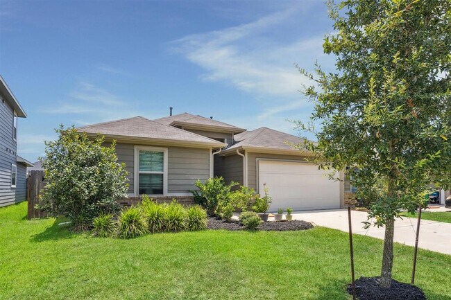 property at 6414 Fiddlewood Thicket Ln