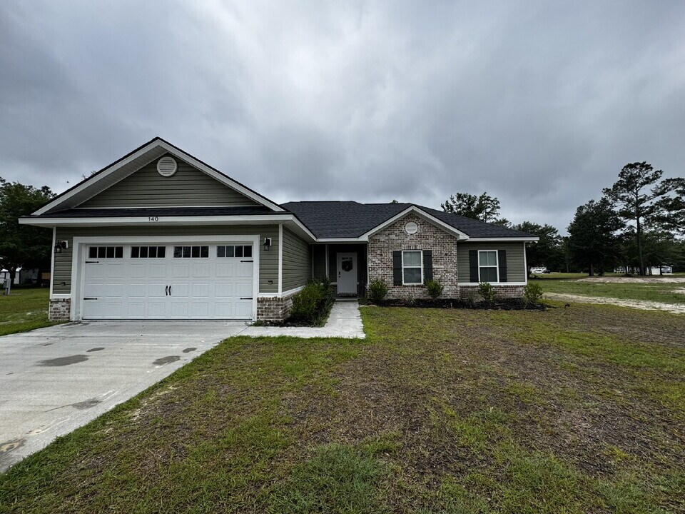 140 Taylors Creek Spur in Ludowici, GA - Building Photo