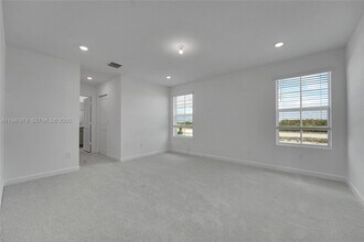 19560 Whispering Creek Rd in Loxahatchee, FL - Building Photo - Building Photo