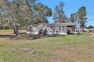 12180 Rebel Rd in Cleveland, TX - Building Photo - Building Photo