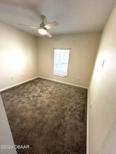 1145 Sand Trap Ct, Unit 405 in Daytona Beach, FL - Building Photo - Building Photo