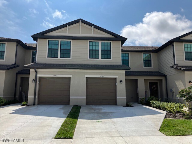 14133 Oviedo Pl in Tice, FL - Building Photo
