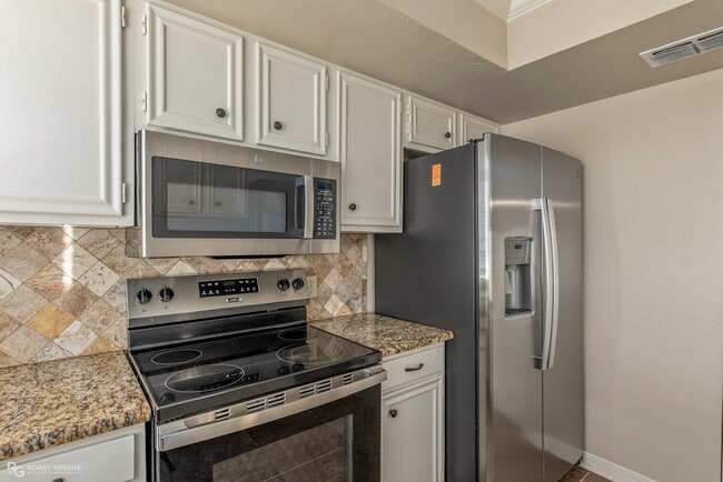 property at 10036 Artesia Dr