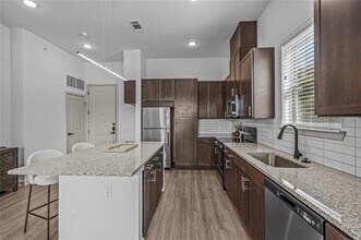7455 W Camp Wisdom Rd in Dallas, TX - Building Photo - Building Photo