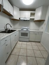 77 Boundary Blvd, Unit D in Rotonda West, FL - Building Photo - Building Photo
