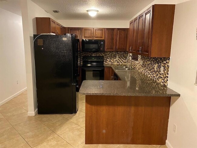 4119 Ponza Pl in Atlantis, FL - Building Photo - Building Photo
