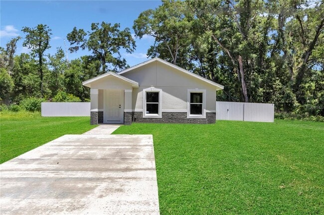 property at 11415 NW 15th St