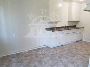 14428 Amar Rd-Unit -APT Q in La Puente, CA - Building Photo - Building Photo