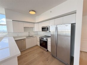 5077 NW 7th St, Unit PH1 in Miami, FL - Building Photo - Building Photo