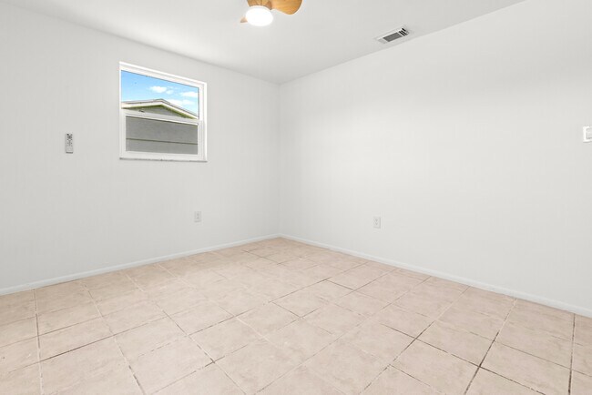 1057 Tropical Ave NW in Port Charlotte, FL - Building Photo - Building Photo