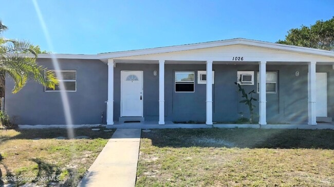 1026 Bacon Cir NE, Unit A in Palm Bay, FL - Foto de edificio - Building Photo