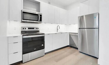 215 E 124th St in New York, NY - Building Photo - Building Photo