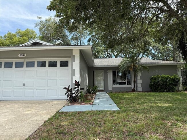8610 Winding Wood Dr in Port Richey, FL - Building Photo - Building Photo