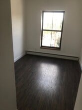 301 Liberty St, Unit 3rd Floor in Newburgh, NY - Foto de edificio - Building Photo