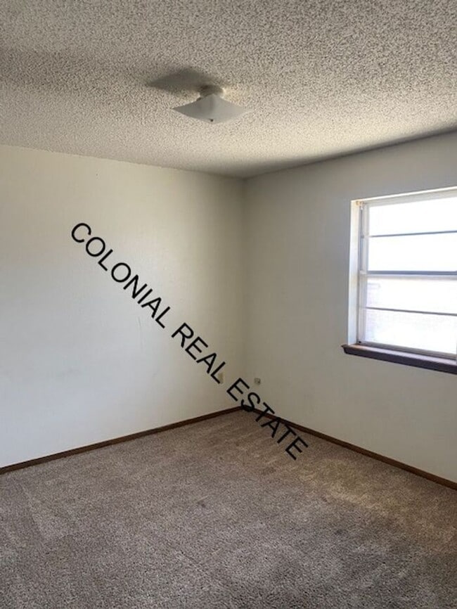 2012 E 14th St in Clovis, NM - Foto de edificio - Building Photo