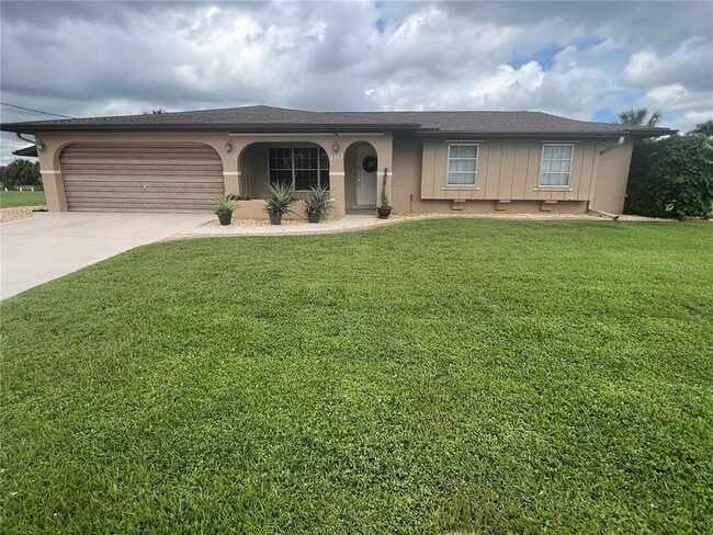 110 Sinclair St SE in Port Charlotte, FL - Building Photo - Building Photo