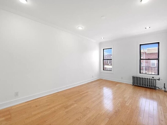 property at 44-14 Newtown Rd