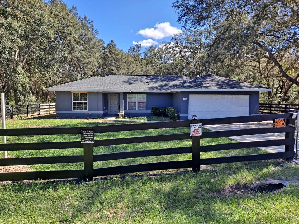 135 Fisher Way Trail in Ocklawaha, FL - Building Photo