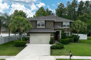 705 W Kings College Dr in Fruit Cove, FL - Building Photo
