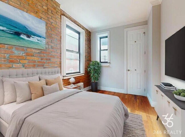 property at 210 E 25th St